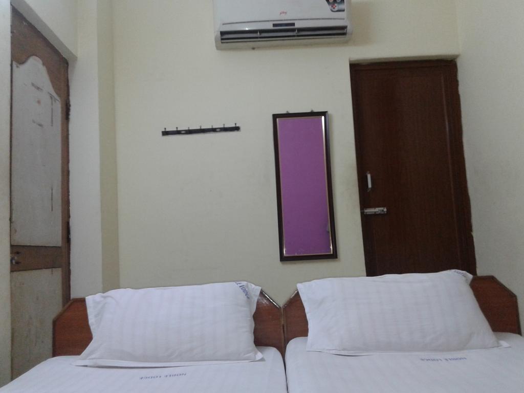 Noble Residency Hotel ตีรูปาติ ห้อง รูปภาพ